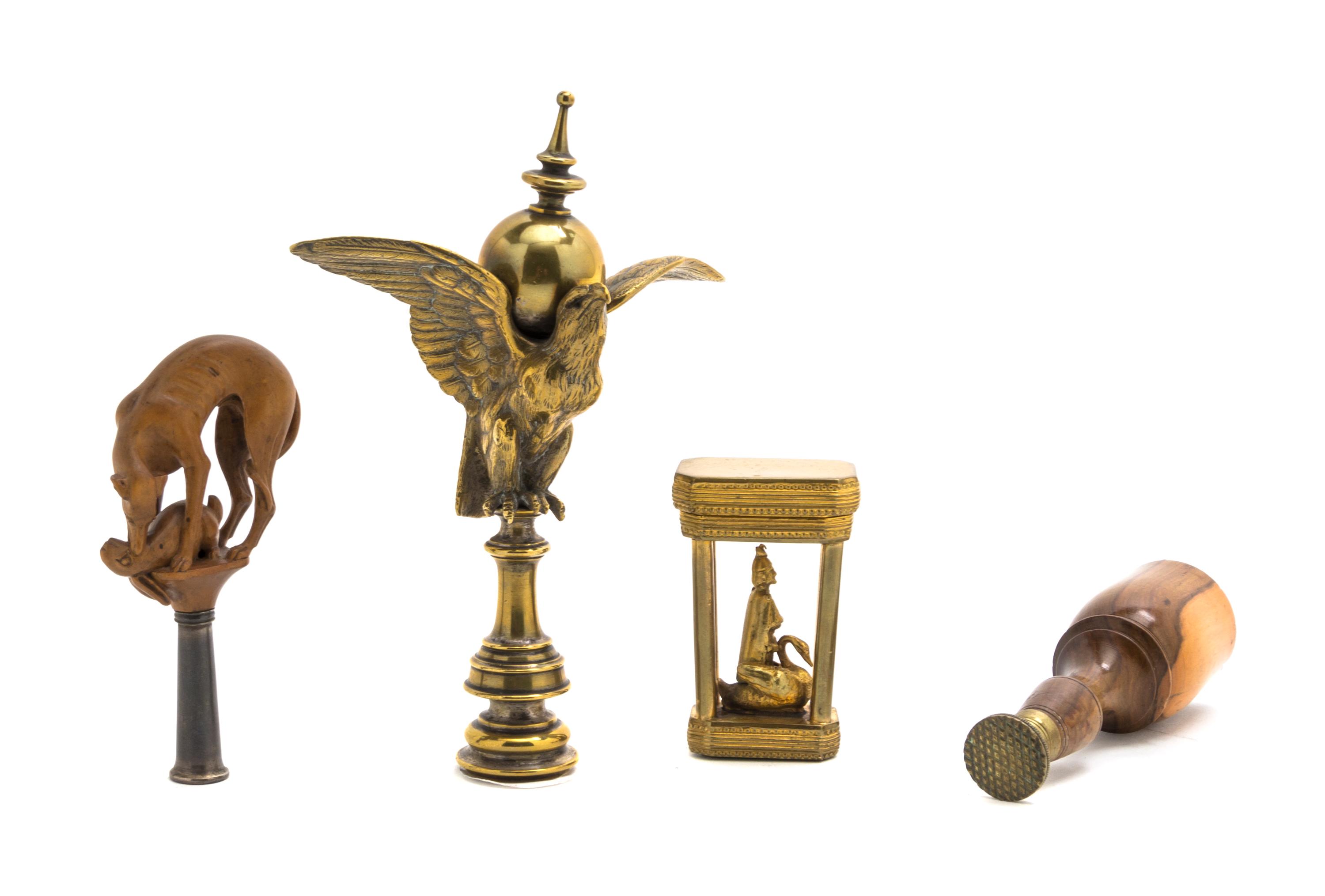 A Gilt Metal Hardstone Inset Figural Seal, Height 2 3/8 inches.