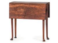 A George III Figured Mahogany Pad-Foot Drop-Leaf Table