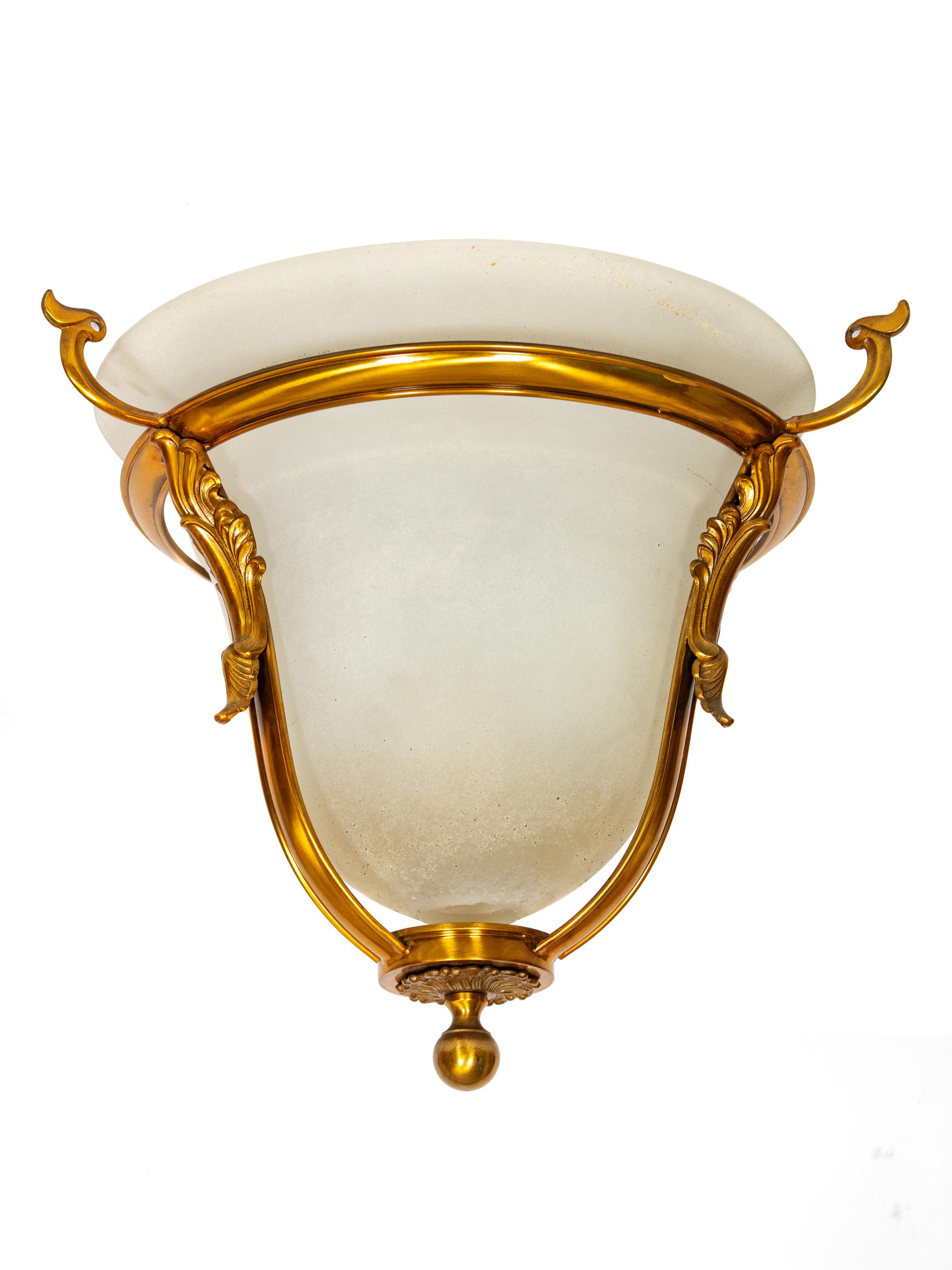 A Pair of Bronze and Opaque White Glass Pendant Lanterns — 20TH CENTURY