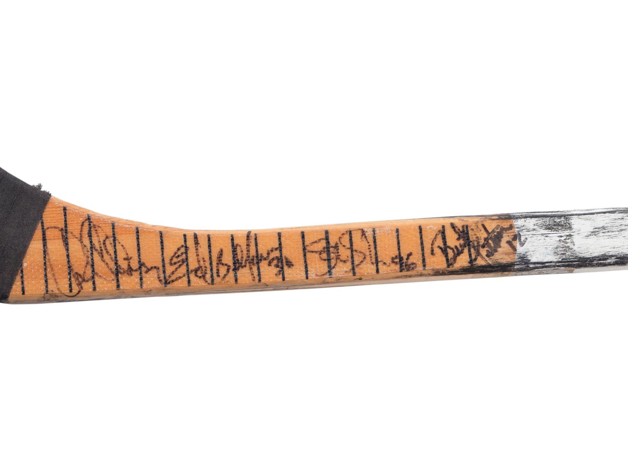 A Brent Sutter Game Used Hockey Stick Signed by Chicago Blackhawks Notables,