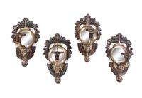 A Set of Four Italian Silvered Metal Single-Light Sconces