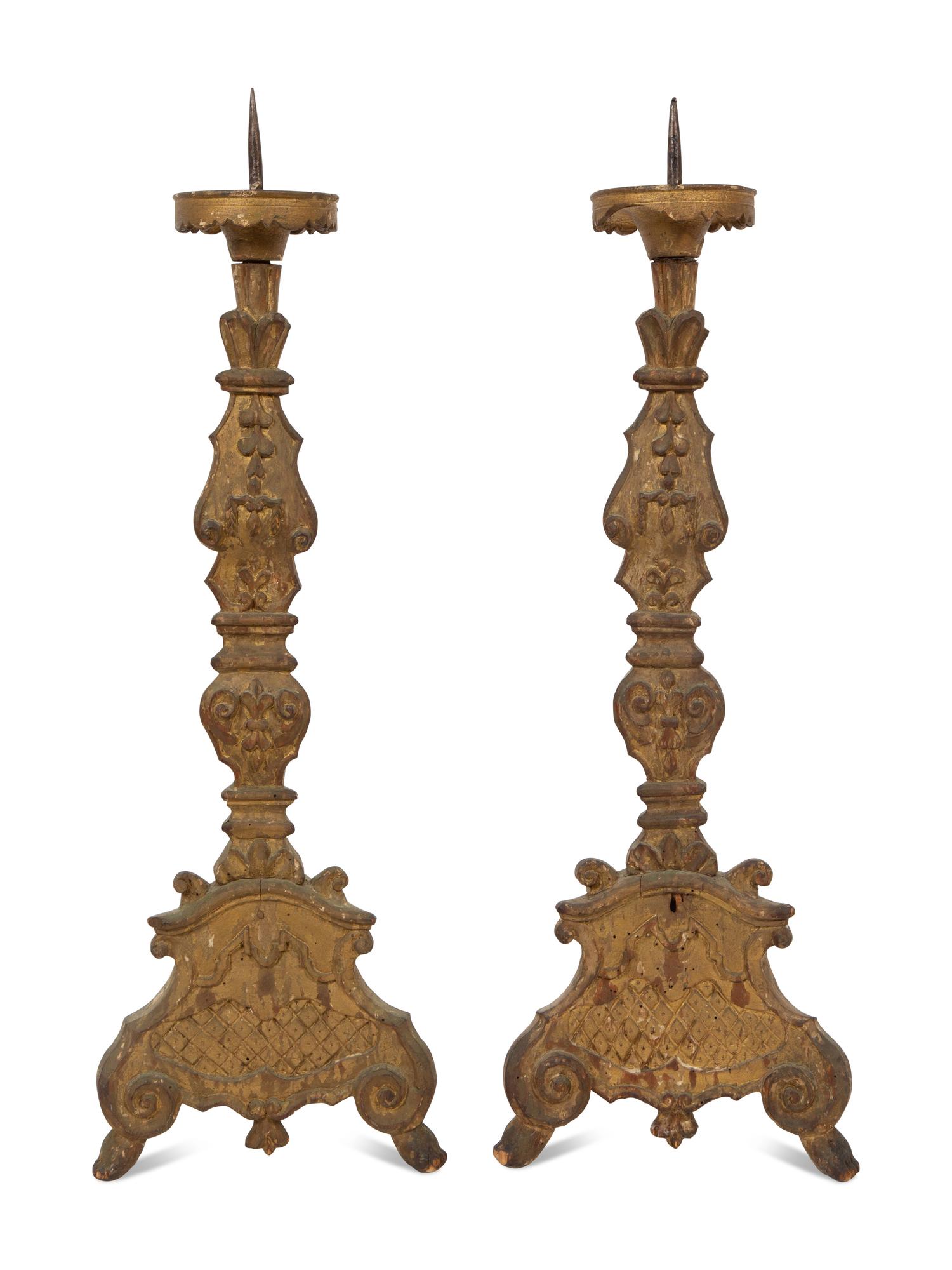 A Pair of Italian Baroque Style Carved Giltwood Pricket Sticks