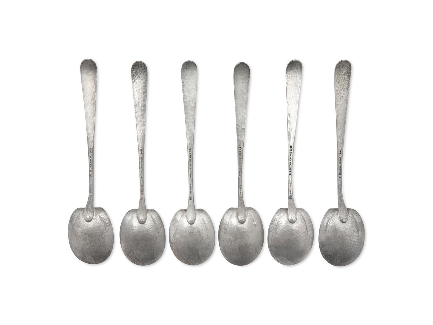 A Set of Six Arts & Crafts Hammered Silver Teaspoons