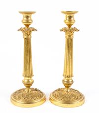 A Pair of Empire Style Gilt Metal Candlesticks Height 11 1/4 inches. — LATE 19TH/EARLY 20TH CENTURY
