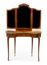A Louis XVI Style Mahogany and Gilt Metal Mounted Dressing Table, Height 62 x width 39 1/2 x depth 20 1/2 inches.