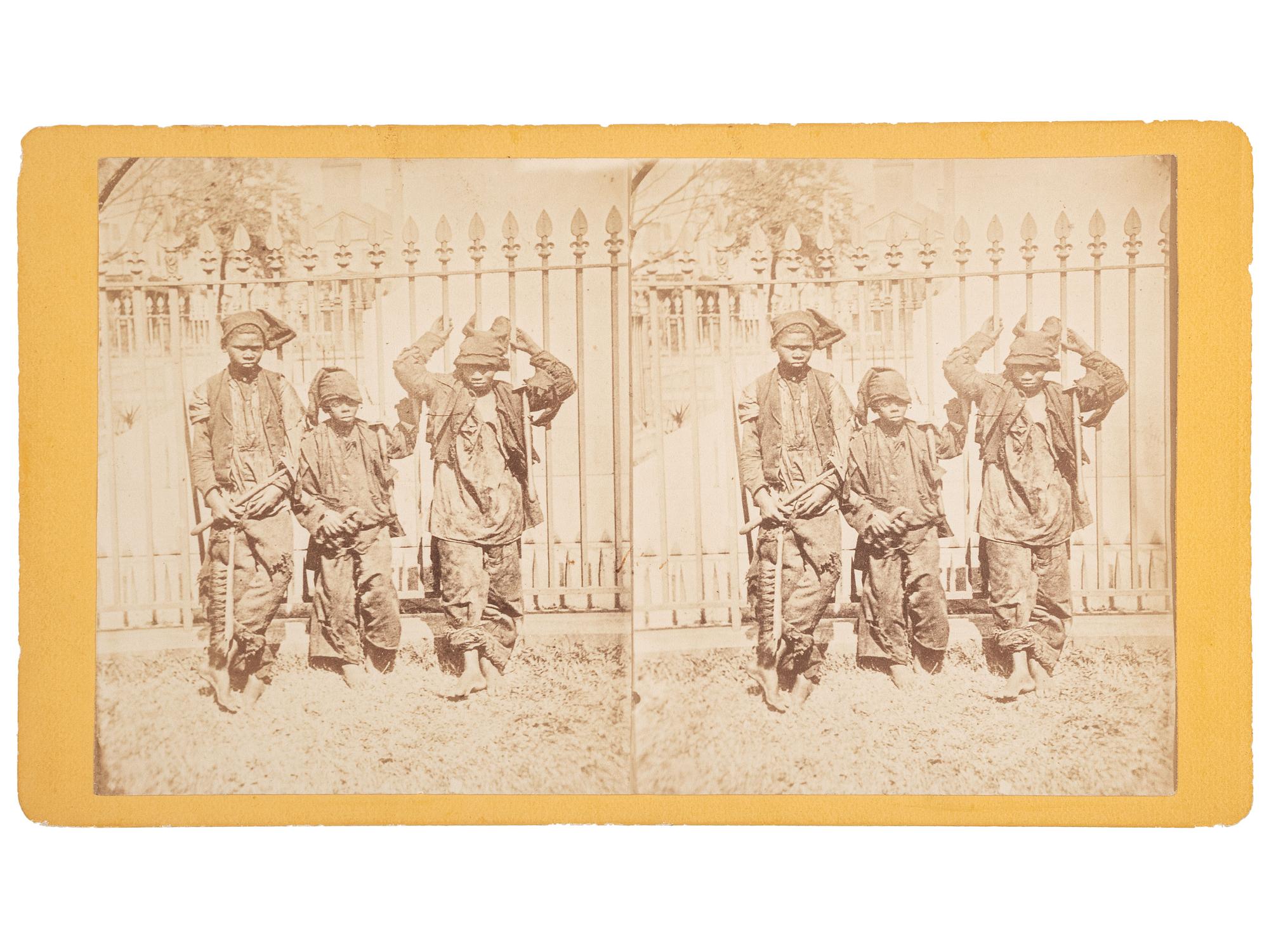 [EARLY PHOTOGRAPHY]. PALMER, J.A., and HAVENS, photographers. A group of 2 stereoviews of African American subjects, incl. Chimney Sweeps and Cotton Pickers . Ca 1870s.