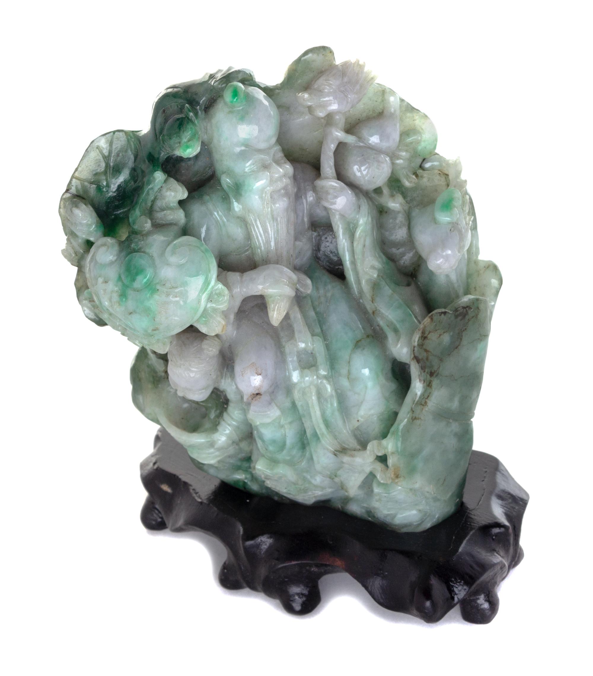 A Burmese Carved Jade Figural Group Height 5 1/4 inches. — 20TH CENTURY