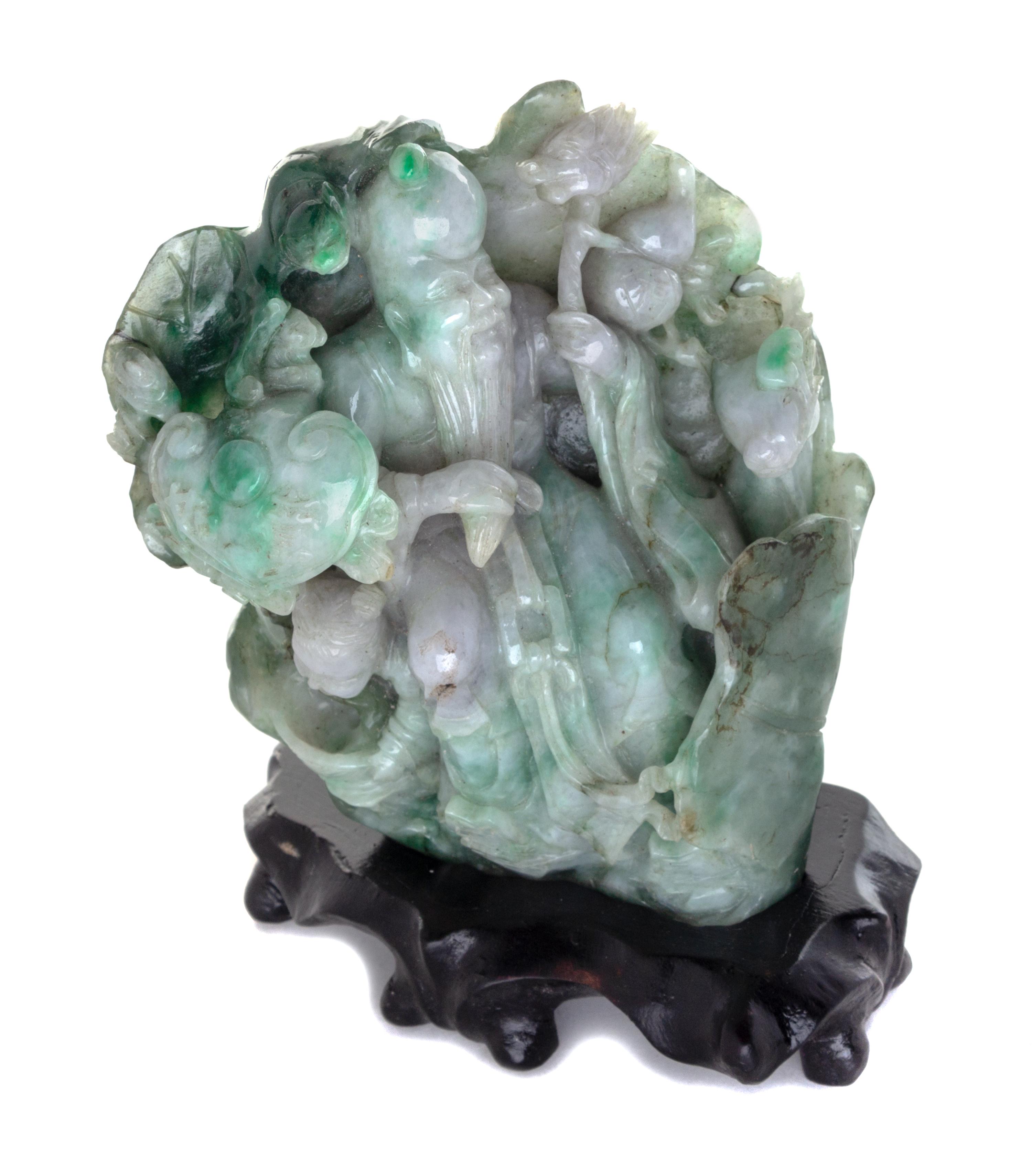 A Burmese Carved Jade Figural Group Height 5 1/4 inches. — 20TH CENTURY