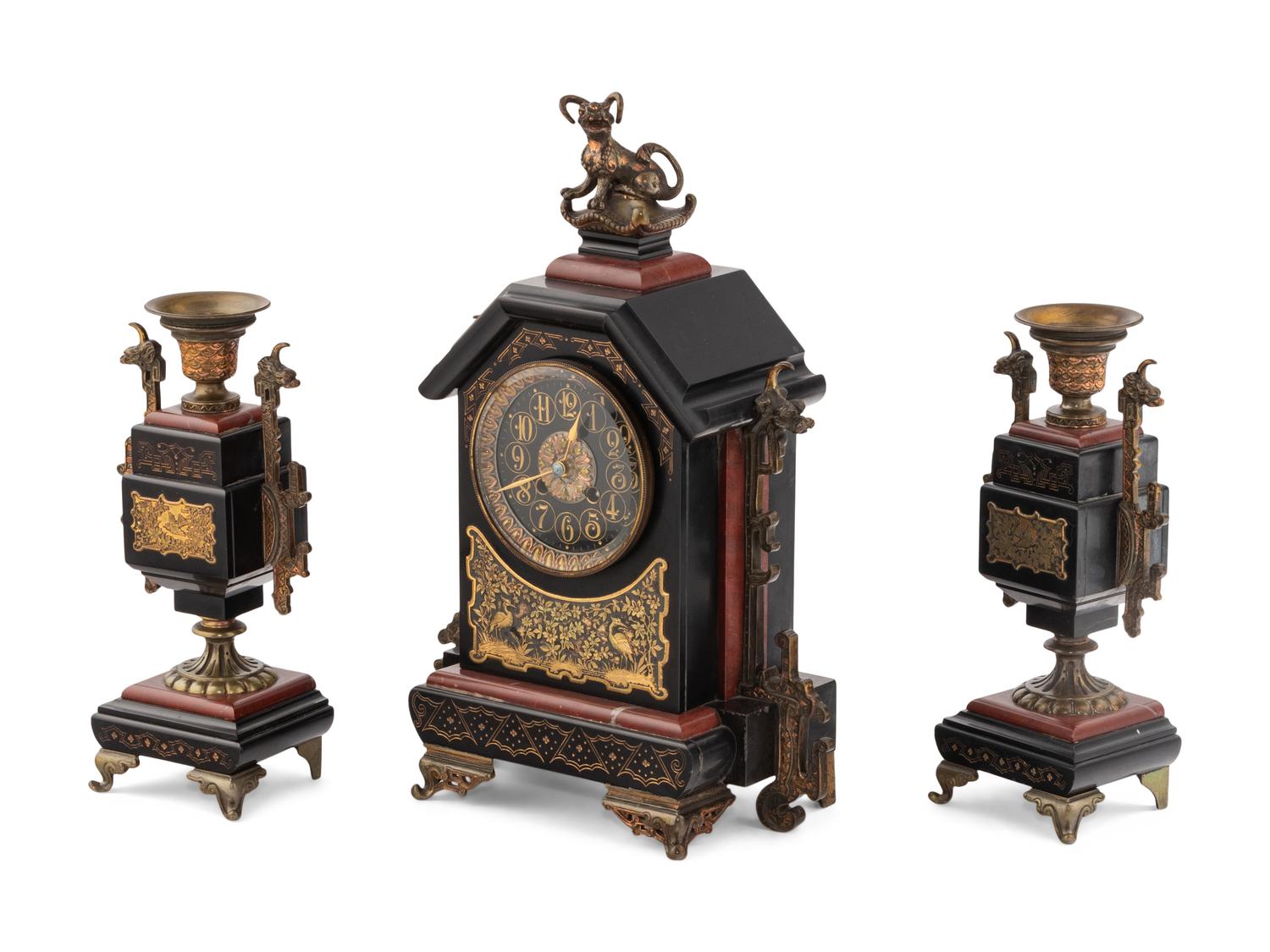A French Gilt Bronze, Marble and Slate Clock Garniture