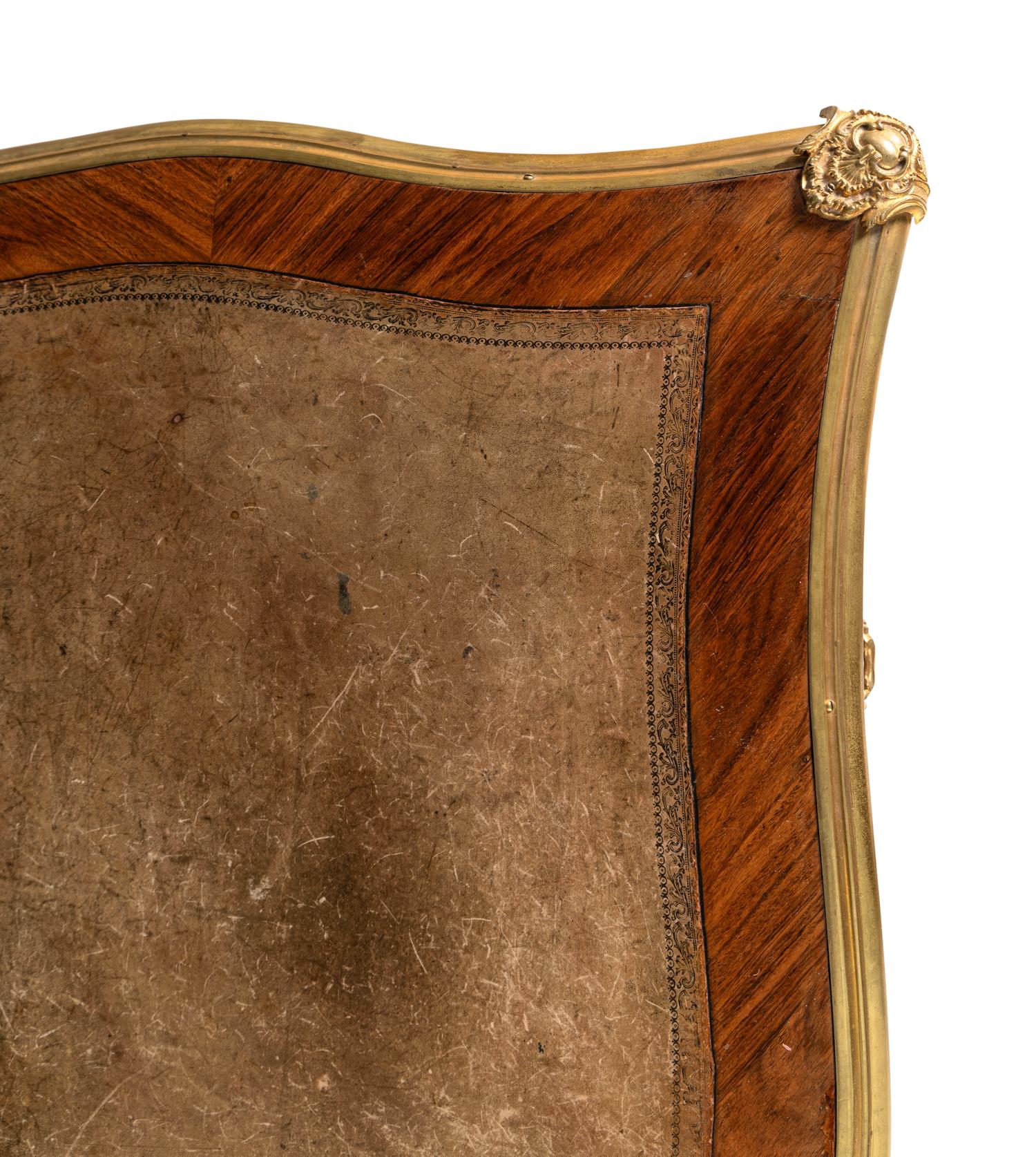 A Louis XV Style Gilt Bronze Mounted Kingwood Bureau Plat
