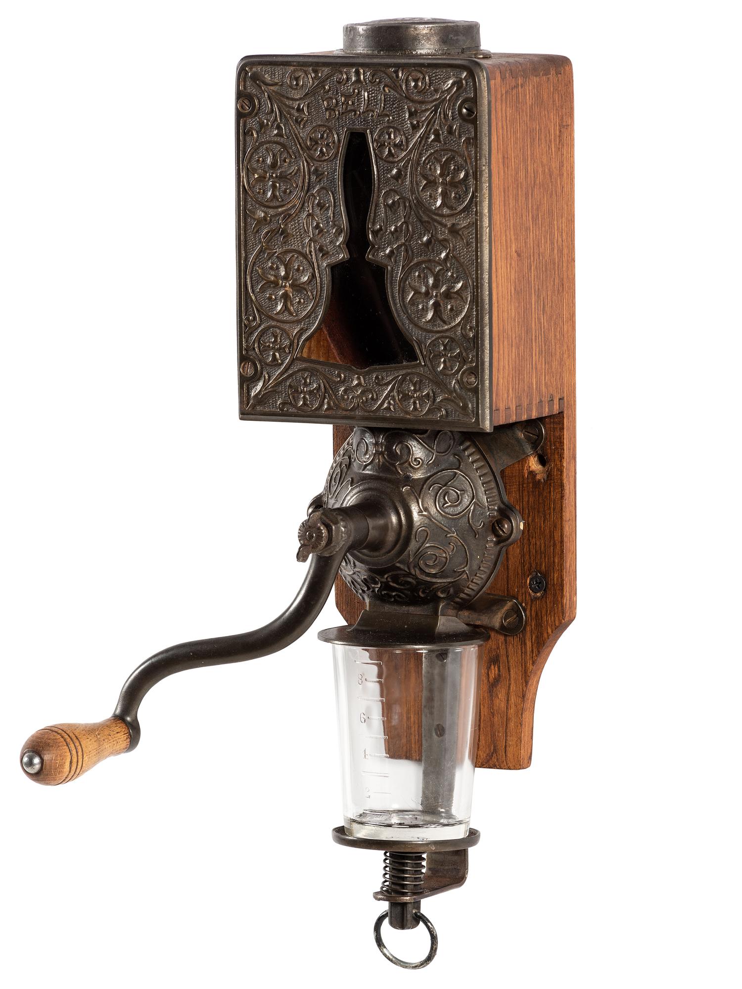 A Bell Cast Iron Wall Mount Coffee Grinder