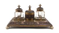 A Neoclassical Gilt Metal and Cut Glass Encrier, Width 9 1/2 inches.