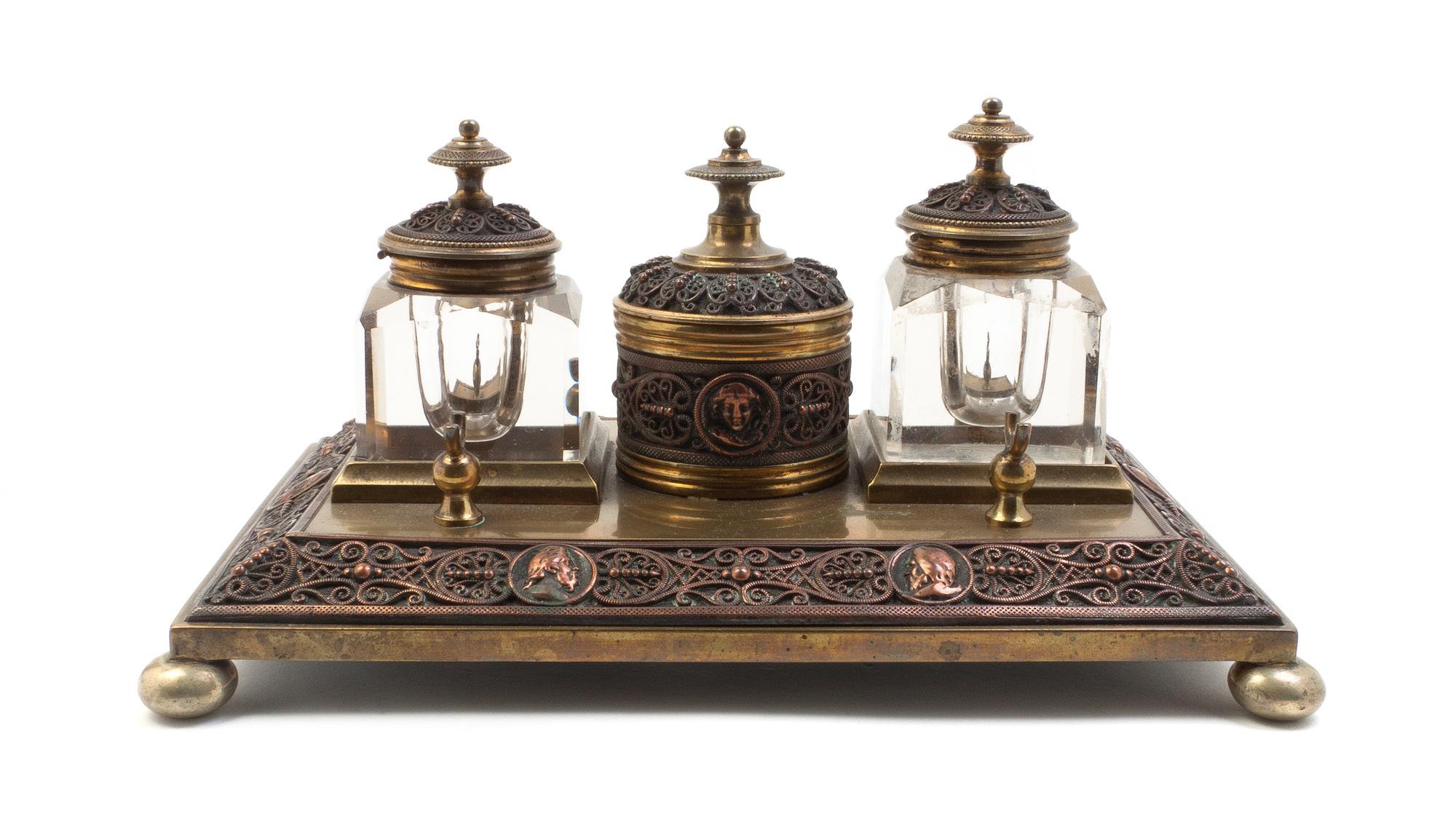 A Neoclassical Gilt Metal and Cut Glass Encrier, Width 9 1/2 inches.