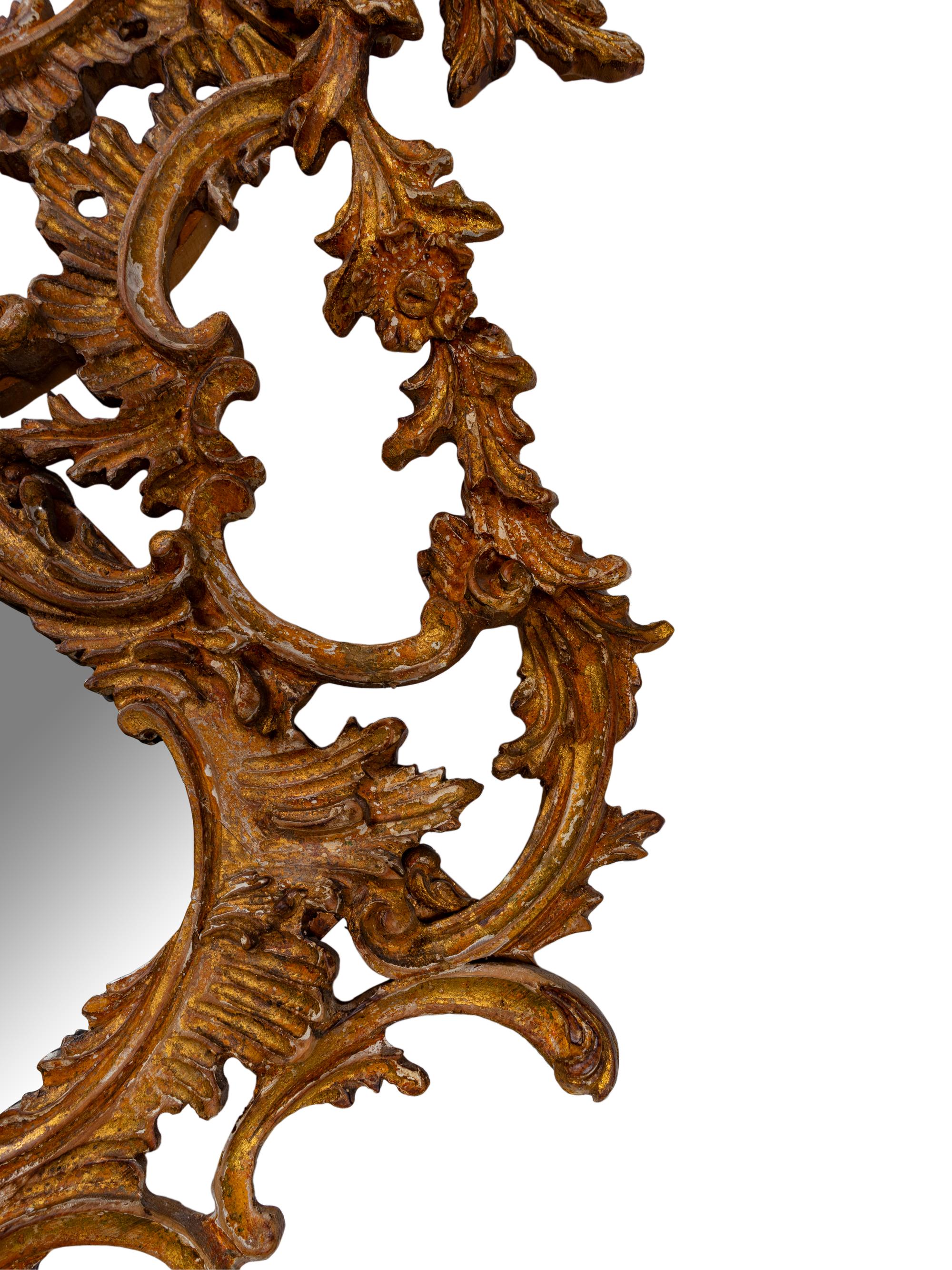 A George II Style Carved and Distressed Gilt Wood Mirror — 19TH CENTURY
