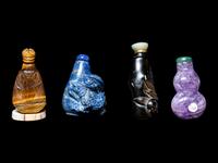 Eight Chinese Precious Stone and Lacquered Snuff Bottles