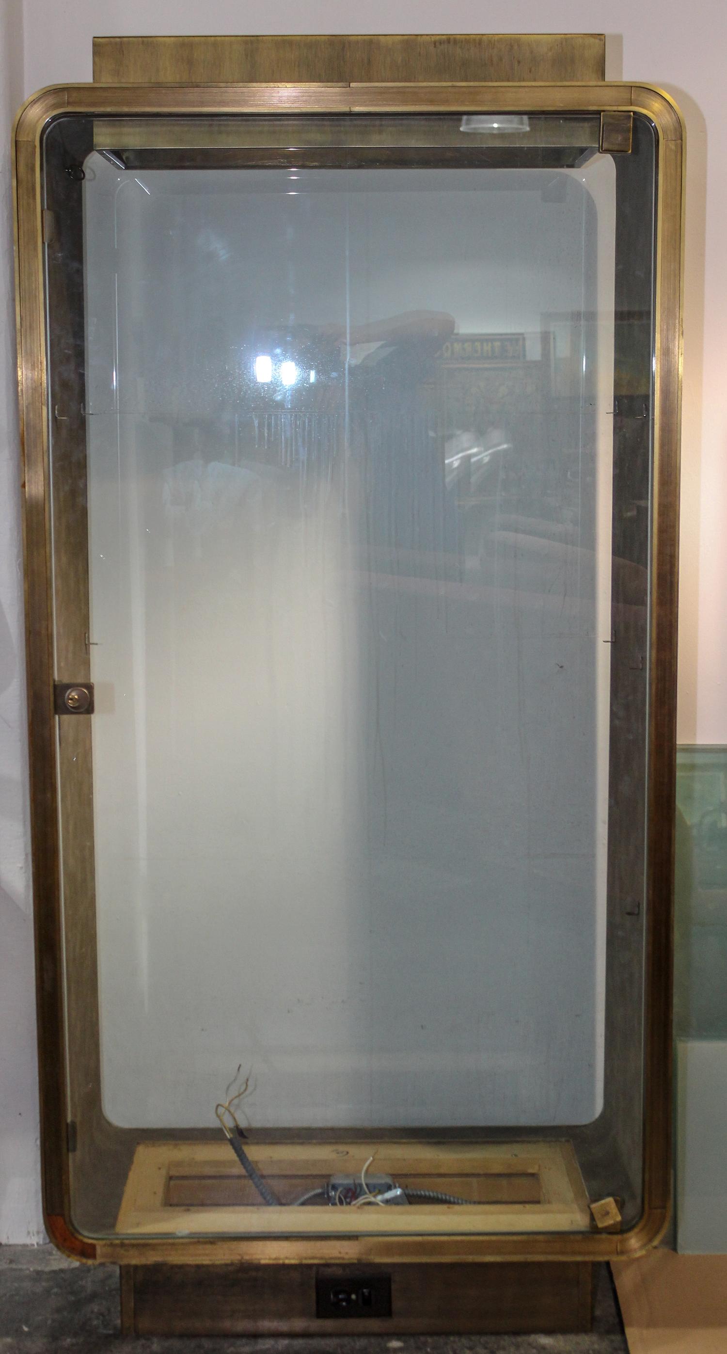 A Bronze Clad Vitrine Height 74 x width 36 x depth 18 inches. — MID 20TH CENTURY