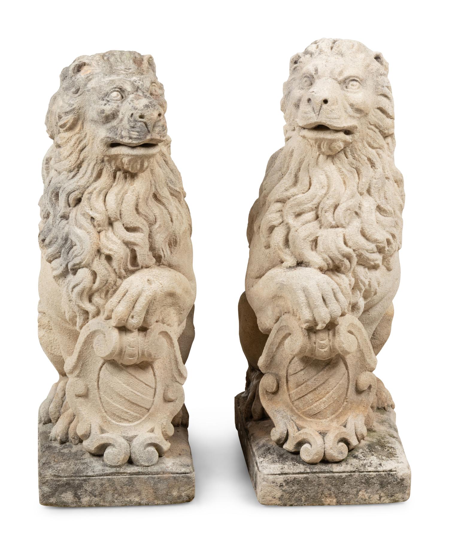 A Pair of Cast Stone Model Lions