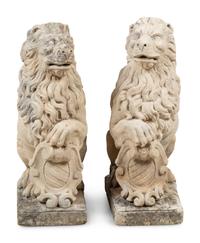 A Pair of Cast Stone Model Lions