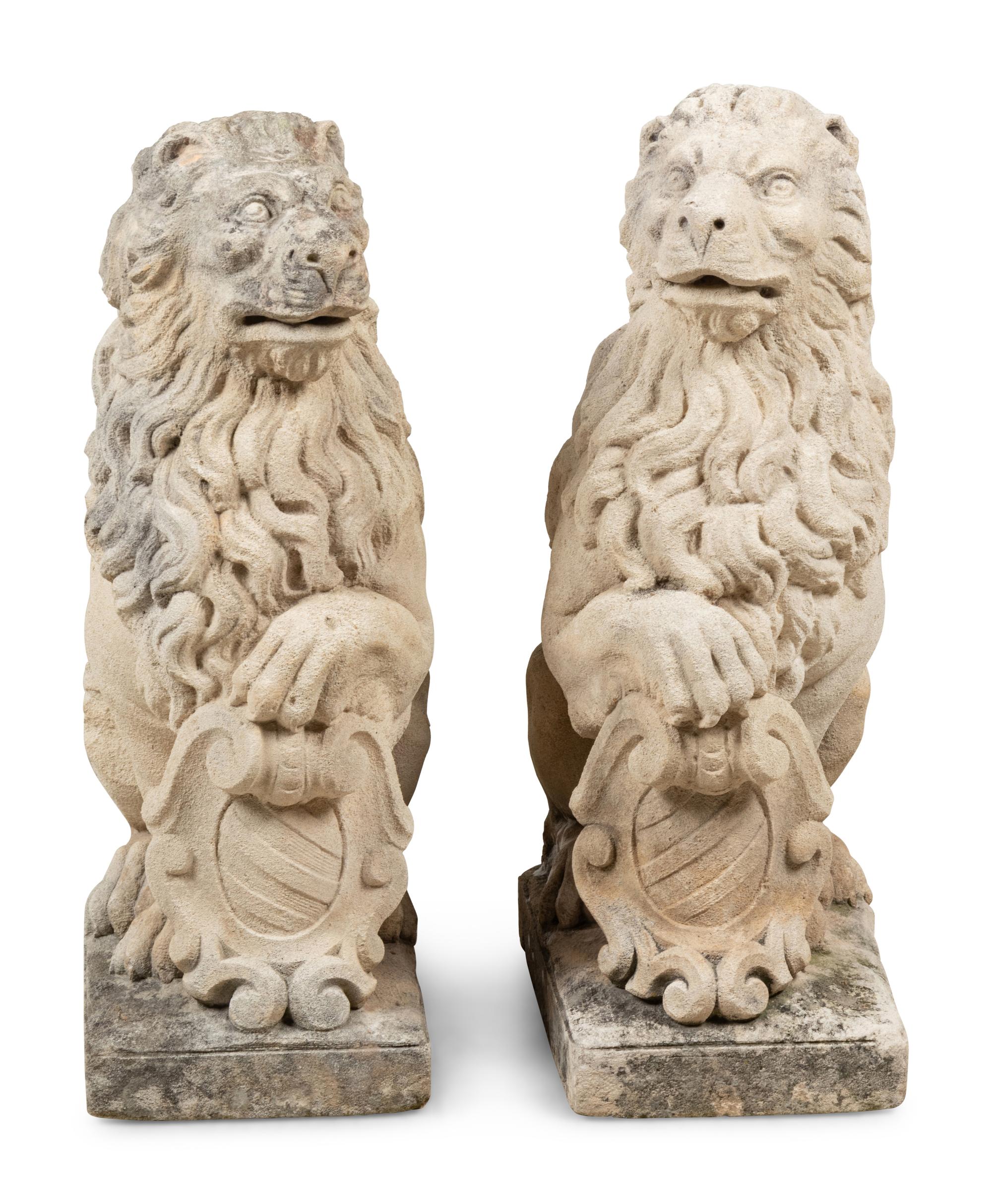 A Pair of Cast Stone Model Lions