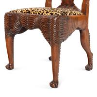 A Set of Eight Anglo-Colonial Yew Wood Dining Chairs