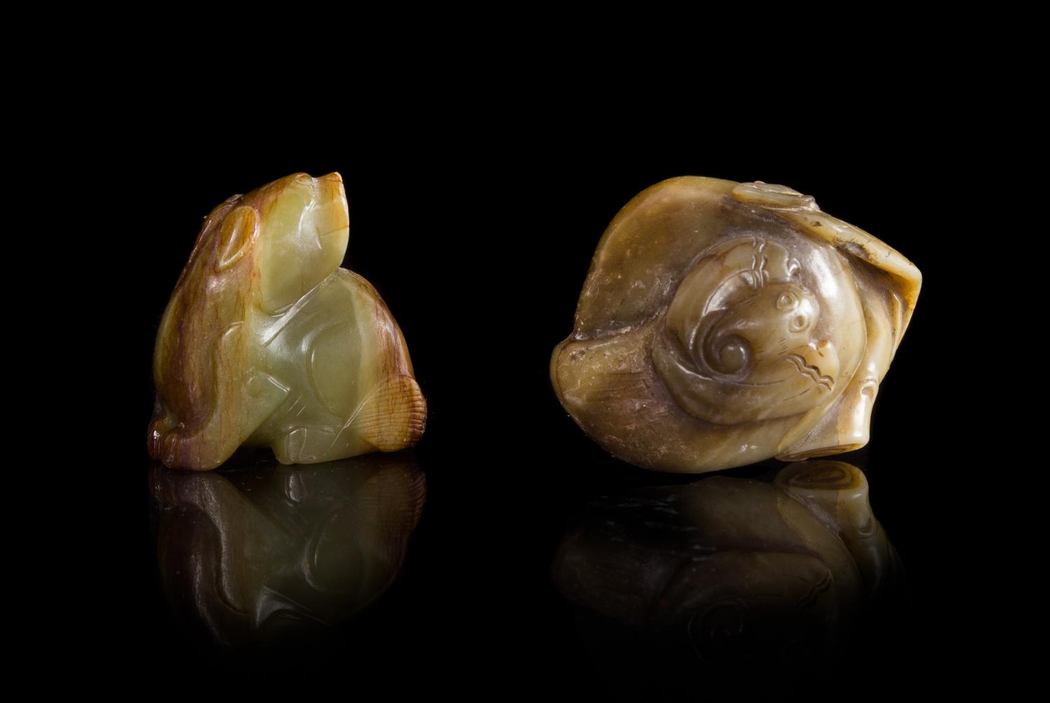 Two Green and Russet Jade Carvings Length of larger 2 1/2 inches.