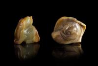 Two Green and Russet Jade Carvings Length of larger 2 1/2 inches.