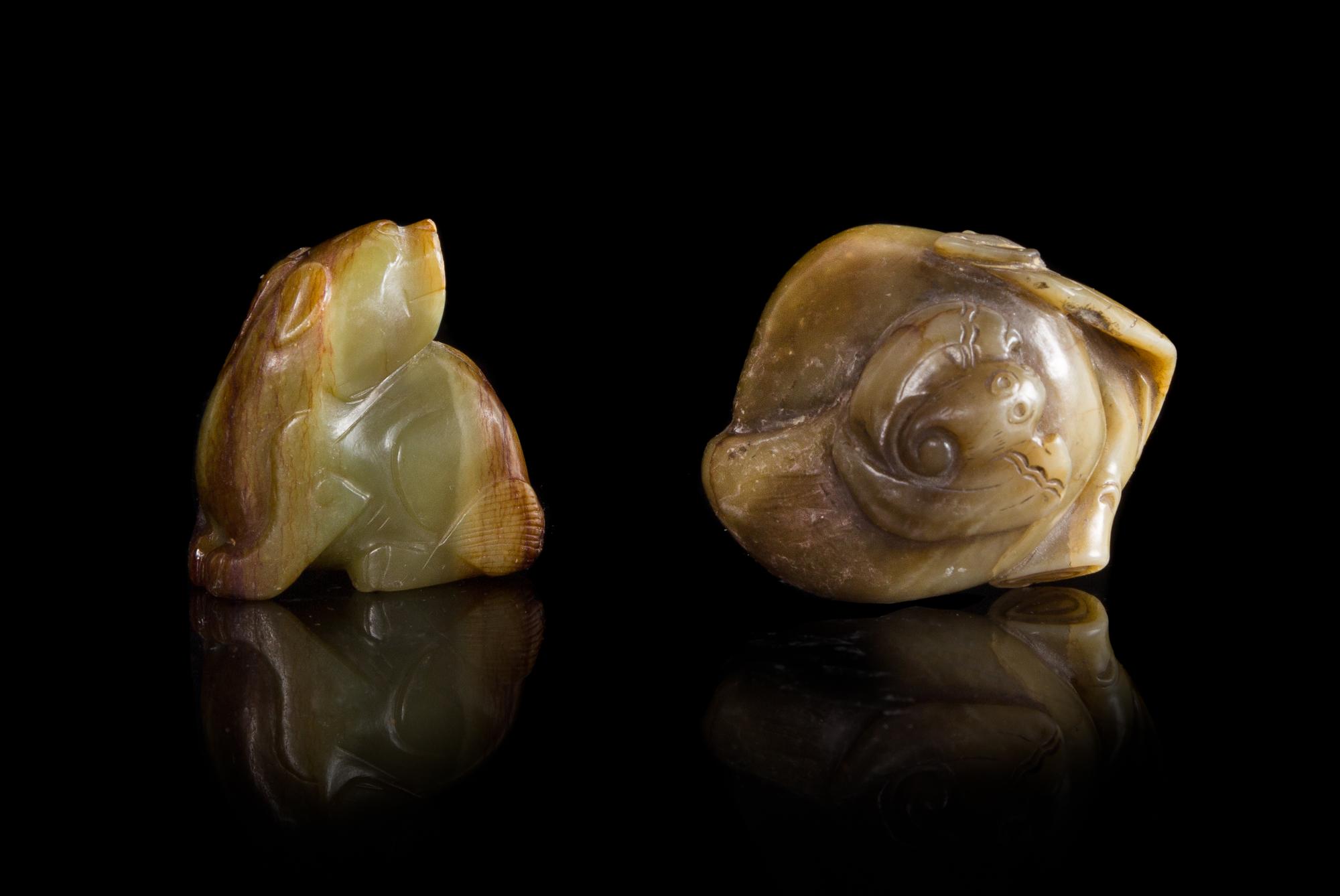 Two Green and Russet Jade Carvings Length of larger 2 1/2 inches.