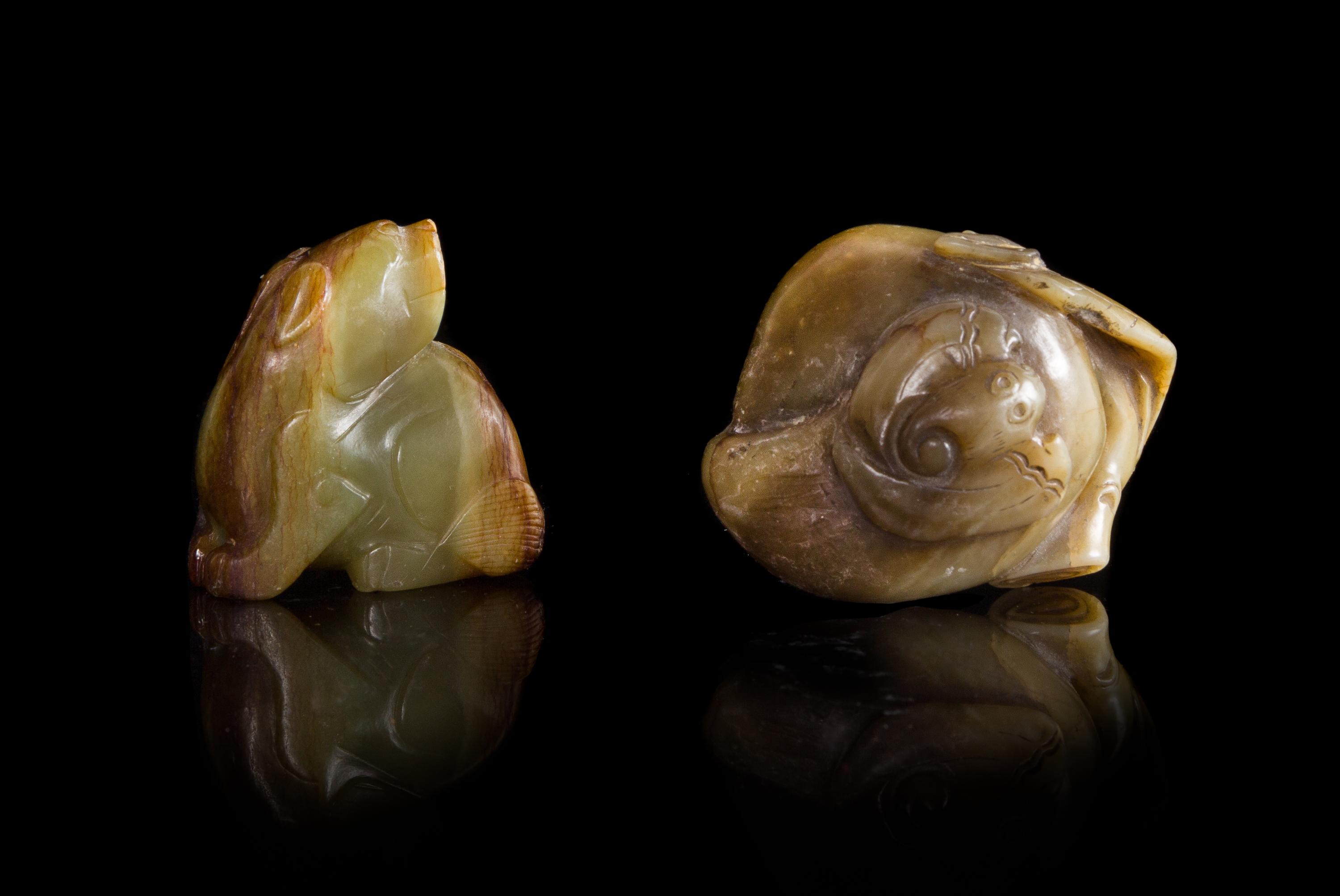 Two Green and Russet Jade Carvings Length of larger 2 1/2 inches.