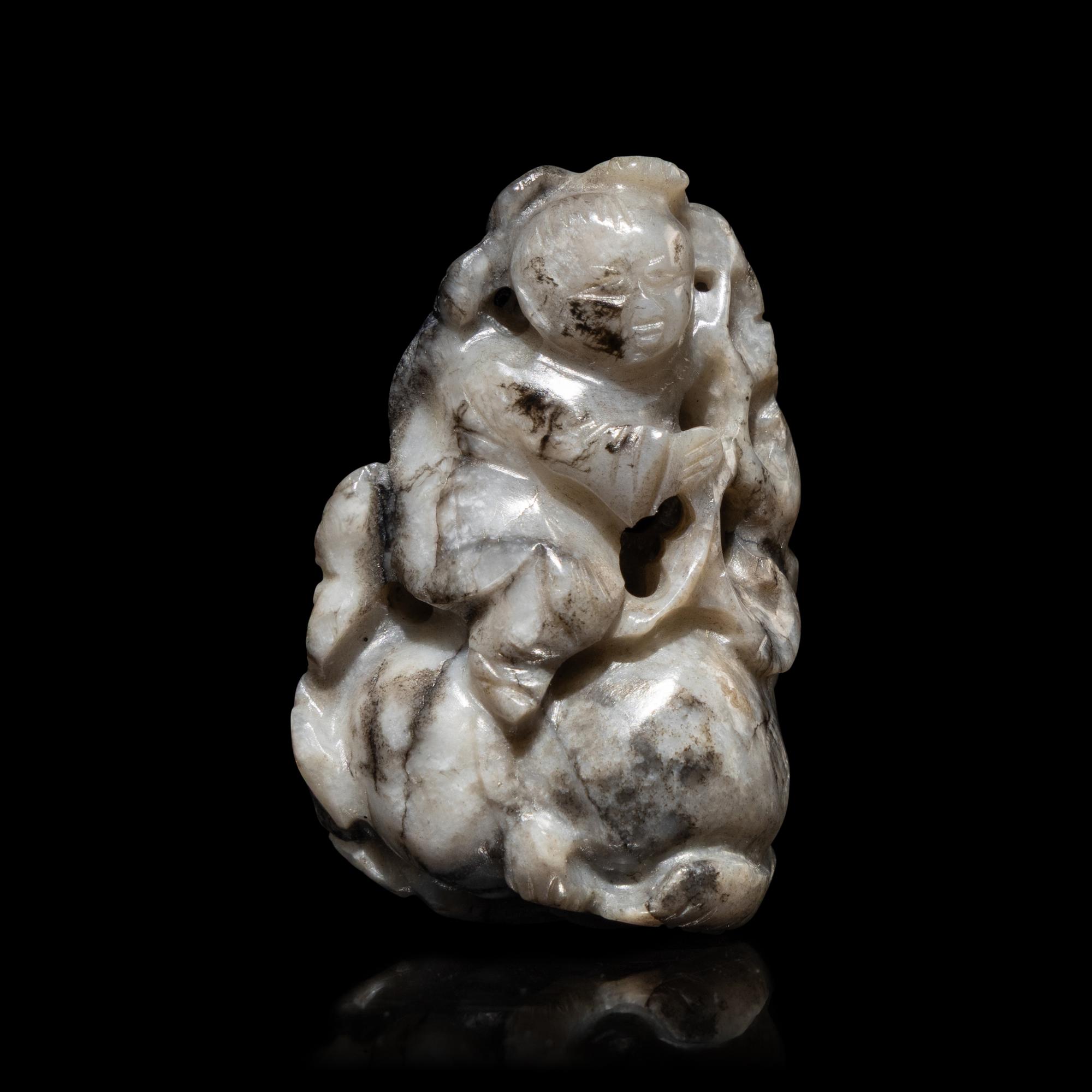 A Chinese Greyish Jade Figure of a Boy, Qing Dynasty — 清 灰玉童子佩