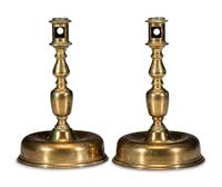 A Pair of Continental Brass Candlesticks