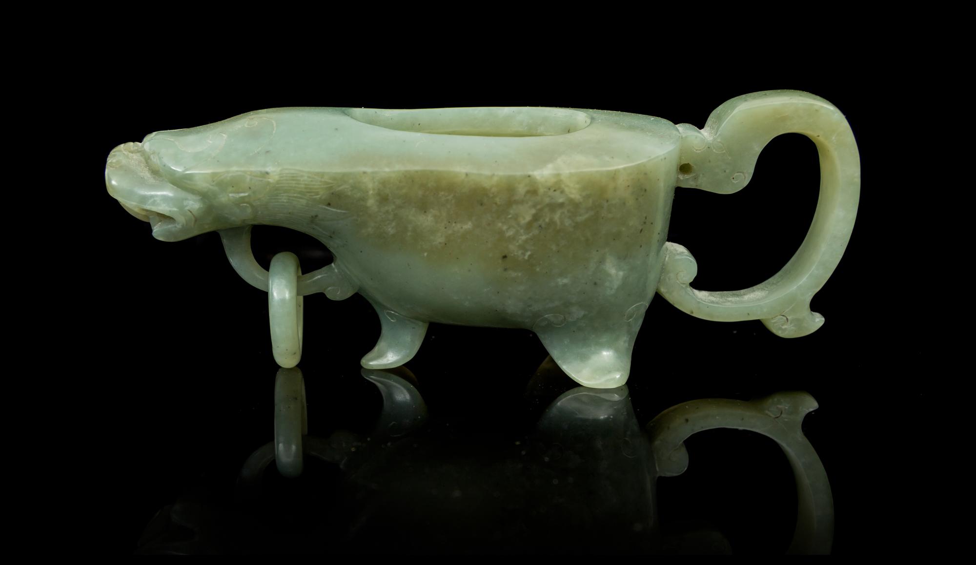 A Carved Jade Water Dropper Length 5 3/4 inches.