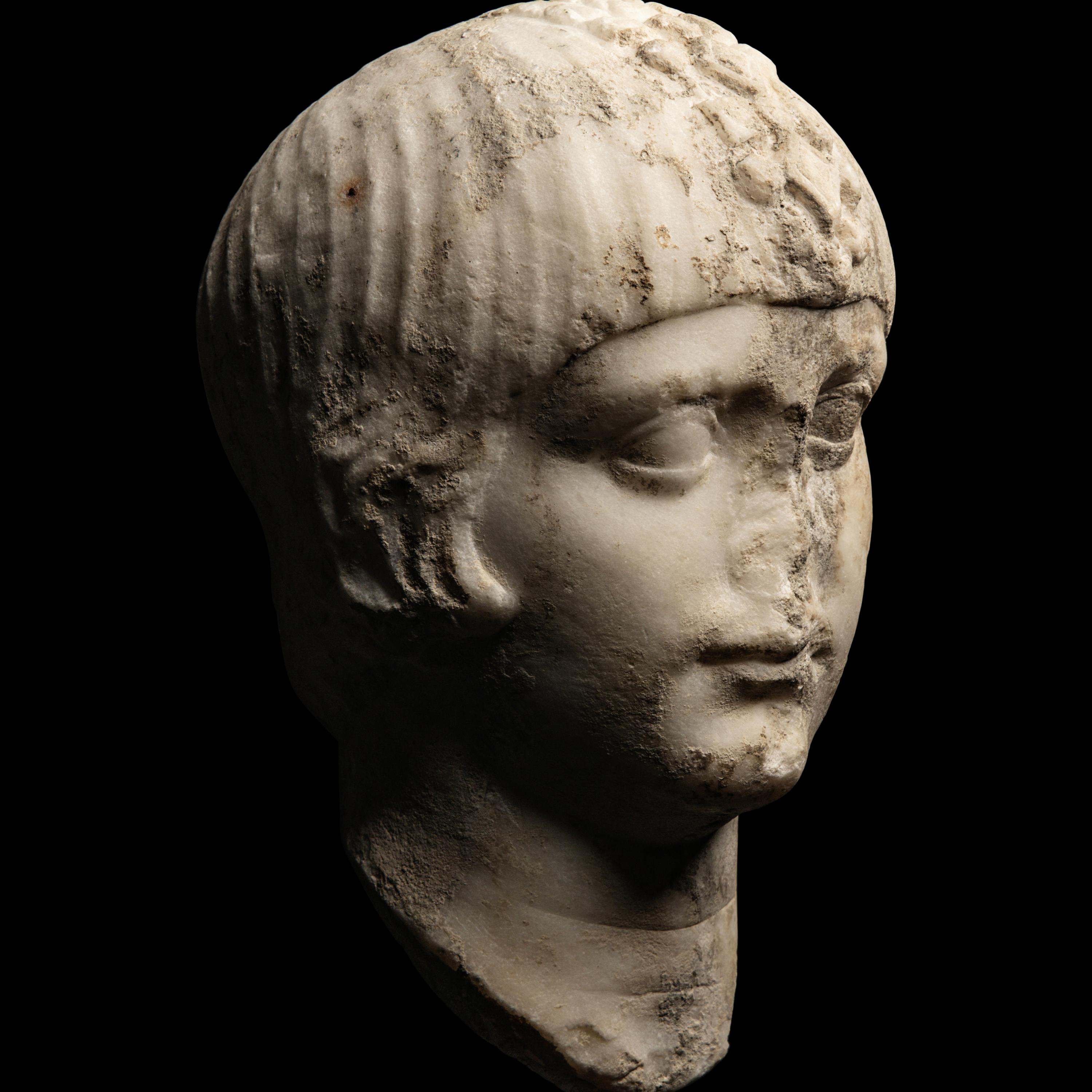 A Roman Marble Portrait Head of a Boy