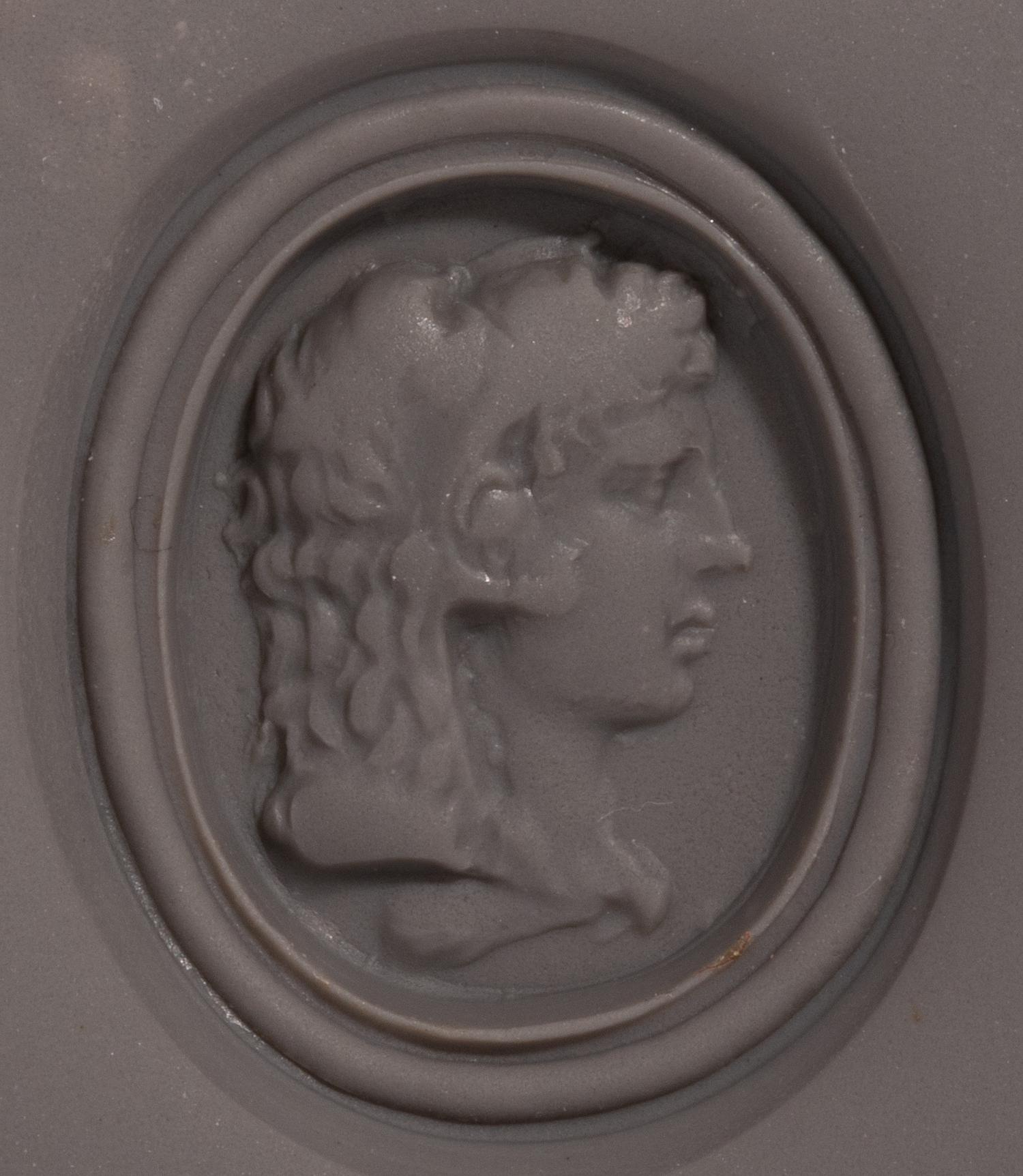 A Neoclassical Gold and Glass Paste Finger Ring with Alexander the Great as Hercules