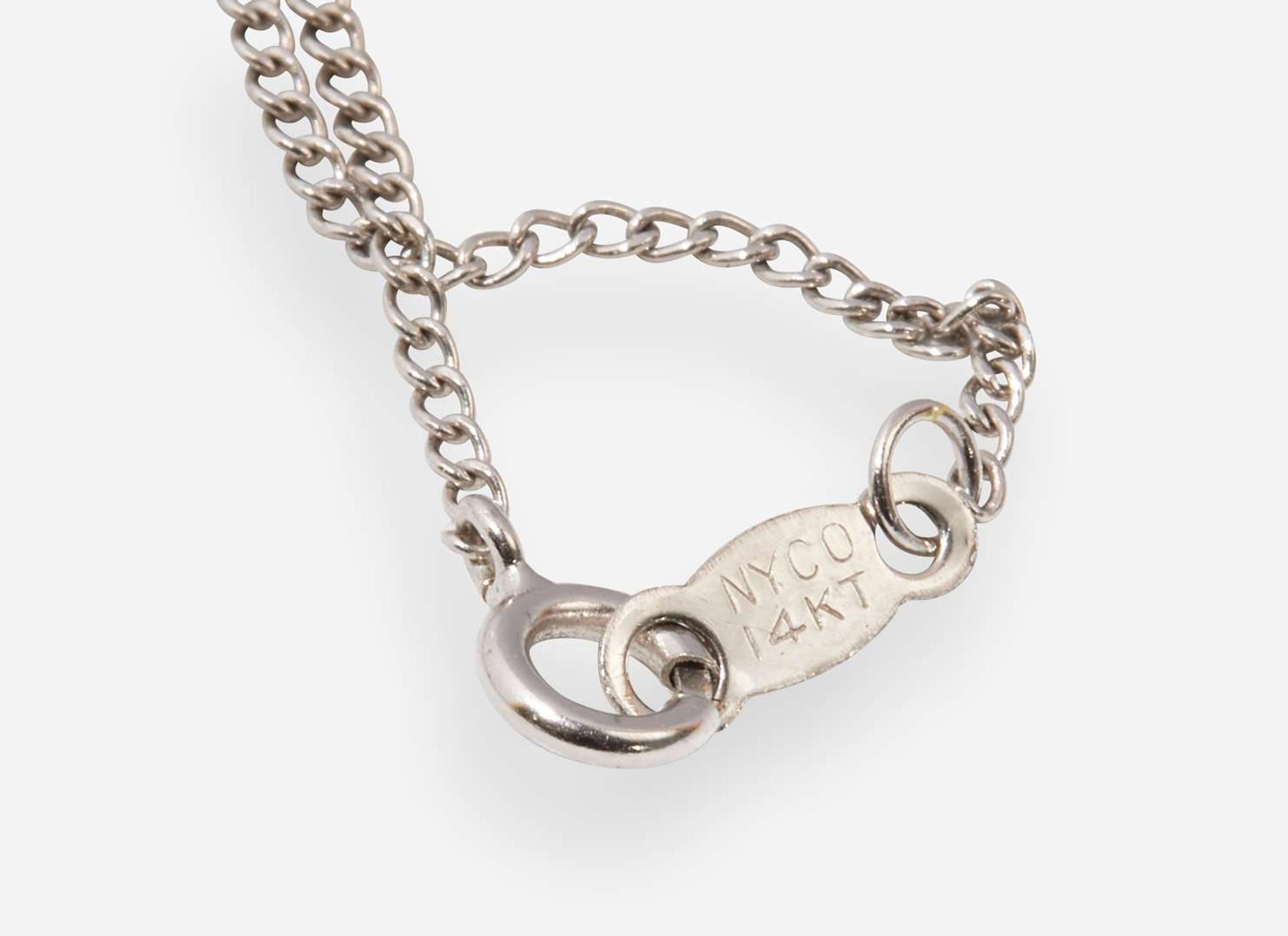 A Set of 14K White Gold and Diamond Earrings and Necklace