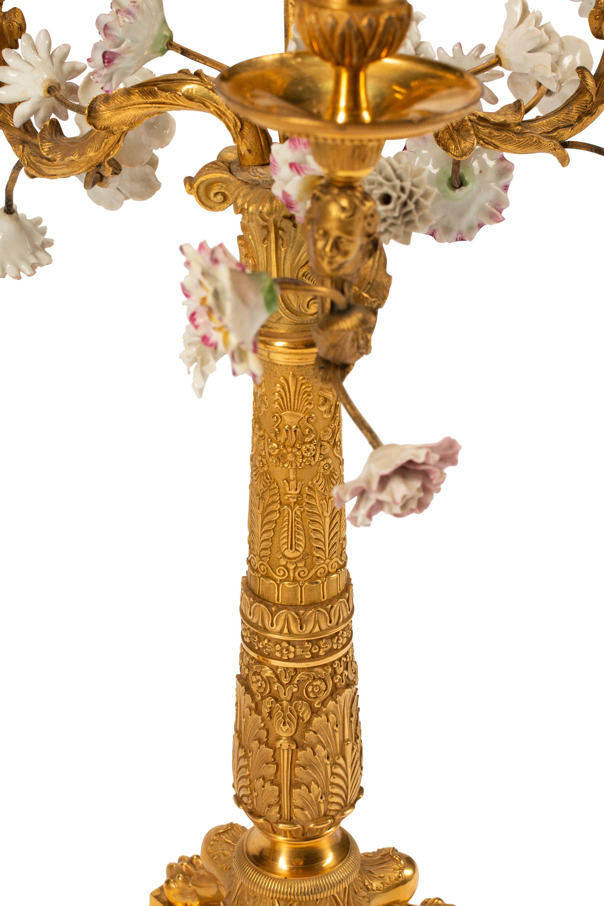 A Pair of Charles X Gilt Bronze and Porcelain Four-Light Candelabra