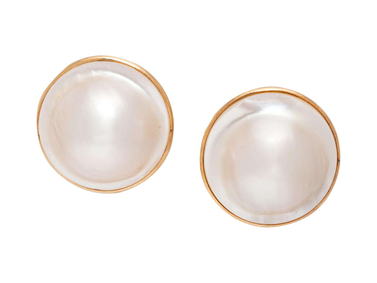 A Pair of 14 Karat Yellow Gold Mabe Pearl Earclips,