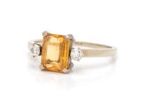 An 18 Karat White Gold, Topaz and Diamond Ring,