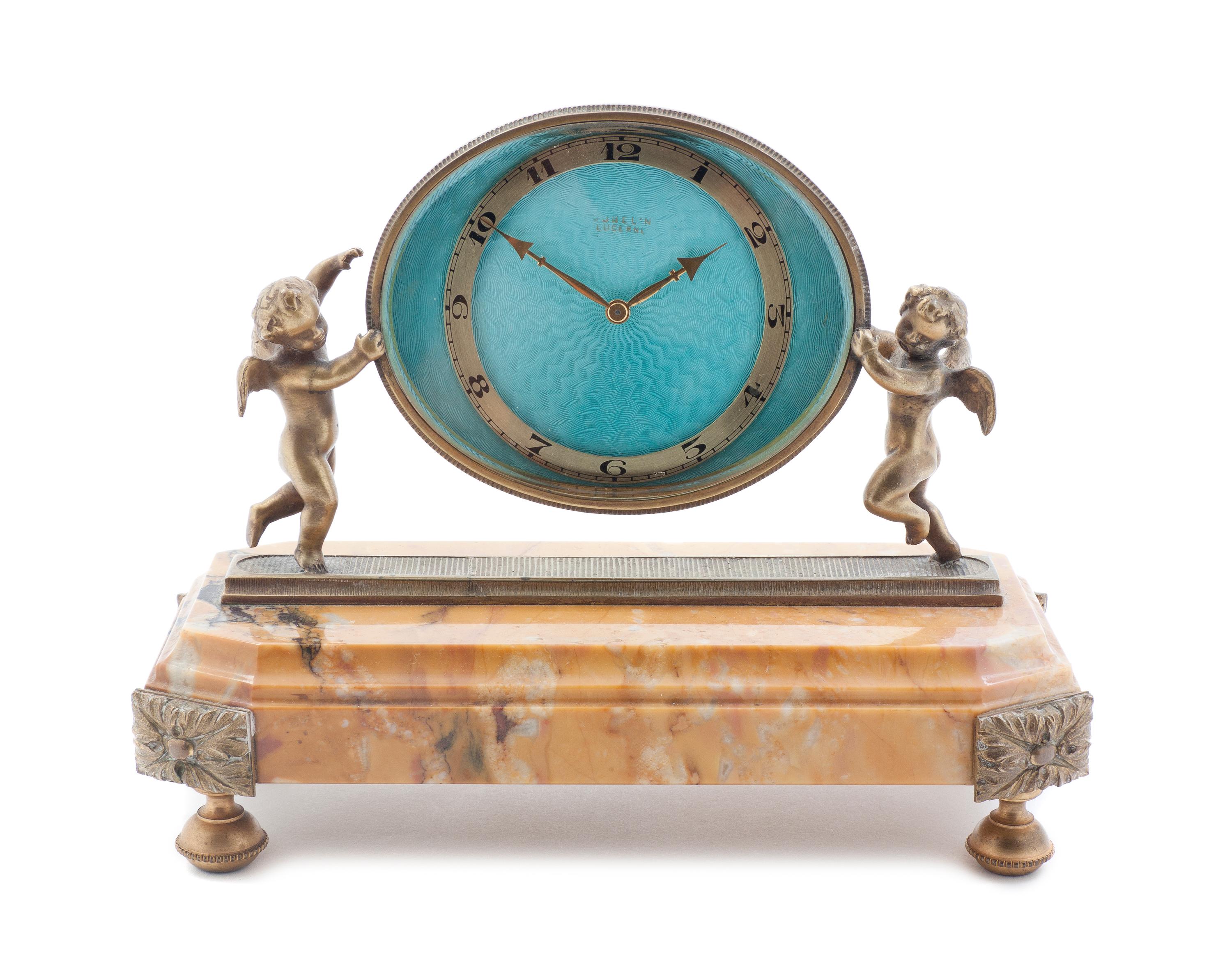 A Swiss Gilt Bronze and Marble Desk Clock, Gubelin, Width 6 3/8 inches.
