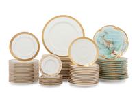 An Assembled Collection of Gilt-Edged Porcelain Dinnerware