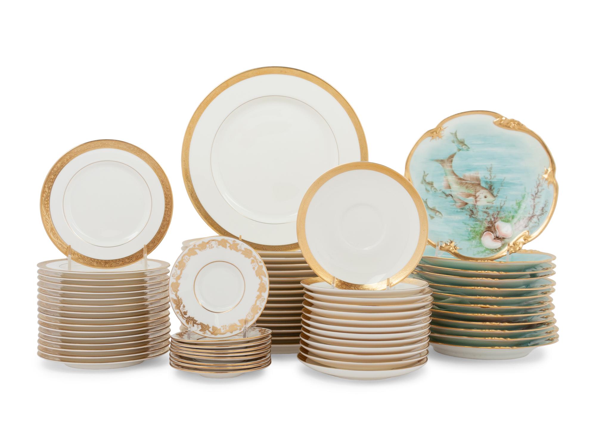 An Assembled Collection of Gilt-Edged Porcelain Dinnerware