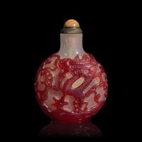 A Chinese Ruby Overlay Glass "Dragons" Snuff Bottle
