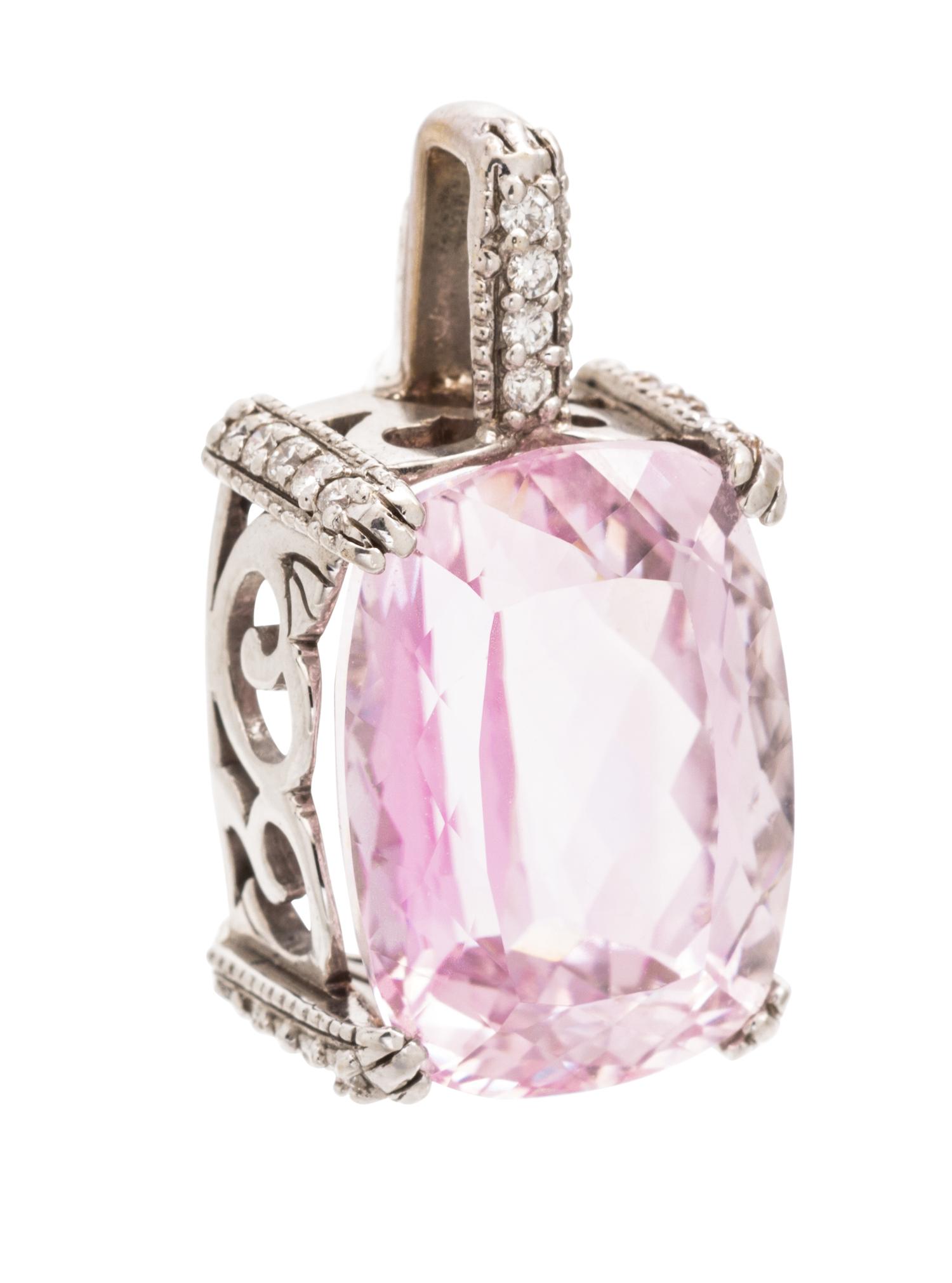 A 14 Karat White Gold, Kunzite and Diamond Pendant, 7.30 dwts.