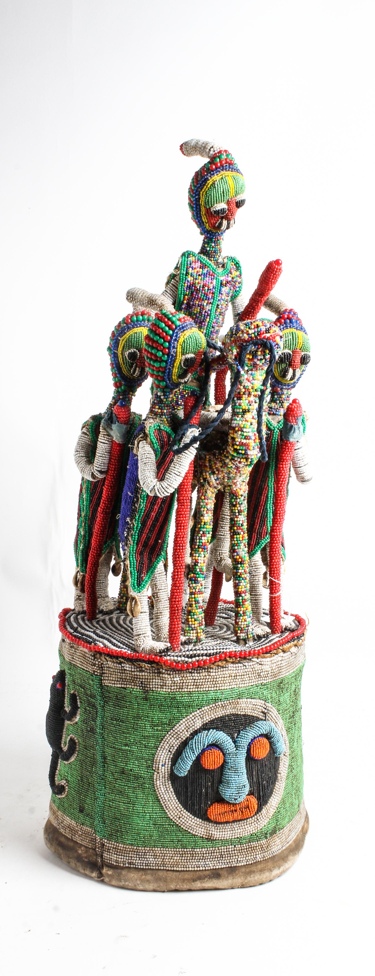 An African Beaded Headdress Height 31 inches.