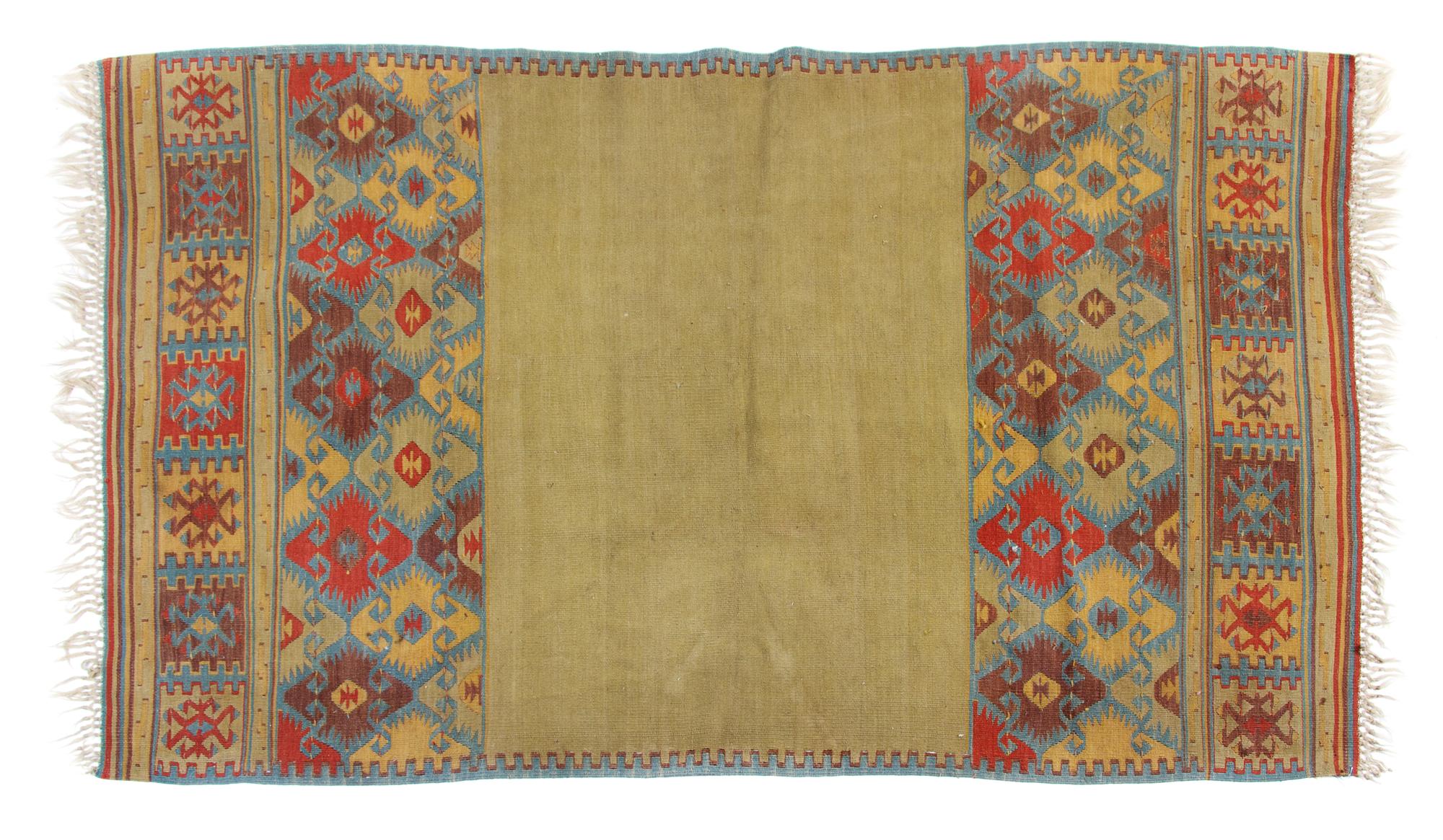 A Turkish Kilim Wool Rug 6 feet 3 inches x 3 feet 10 inches. — CIRCA 1940