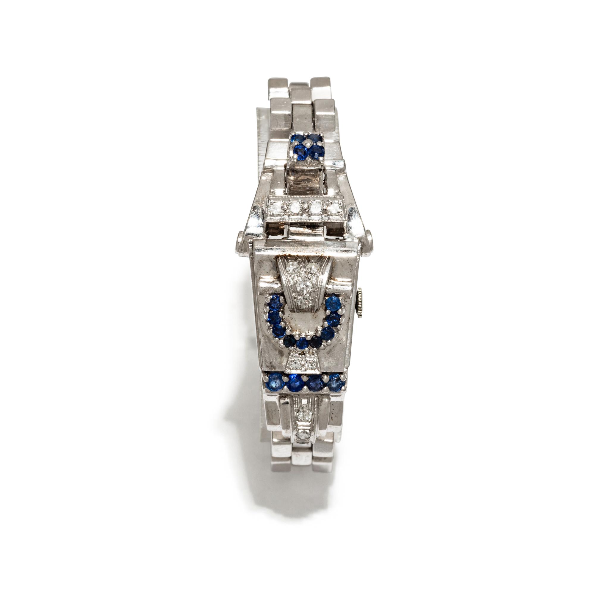 BULOVA, RETRO, WHITE GOLD, DIAMOND, AND SAPPHIRE HIDDEN DIAL WATCH