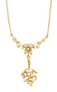 A 14 Karat Yellow Gold and Seed Pearl Articulated Necklace/Brooch, 7.60 dwts.