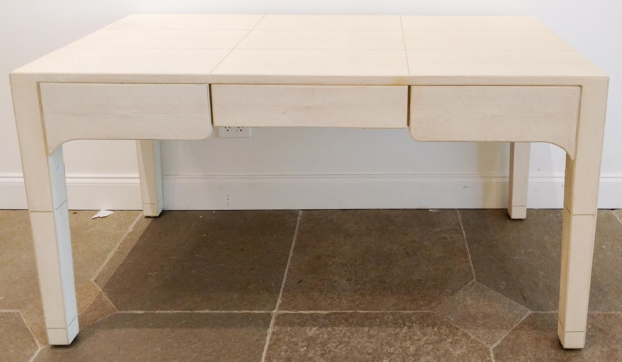 A Faux Ivory Shagreen Writing Table Height 29 1/2 x width 54 x depth 27 inches. — 20TH CENTURY
