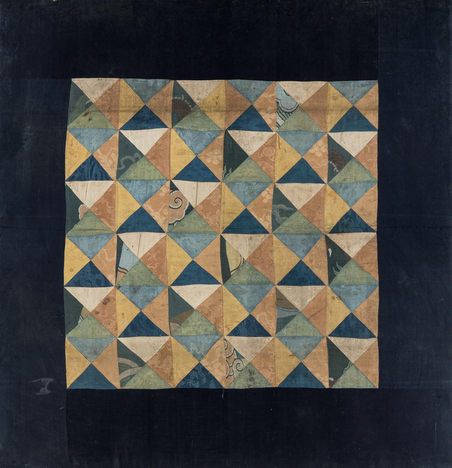 A Tibetan Silk Patchwork Offering Cloth and A Tibetan Rug