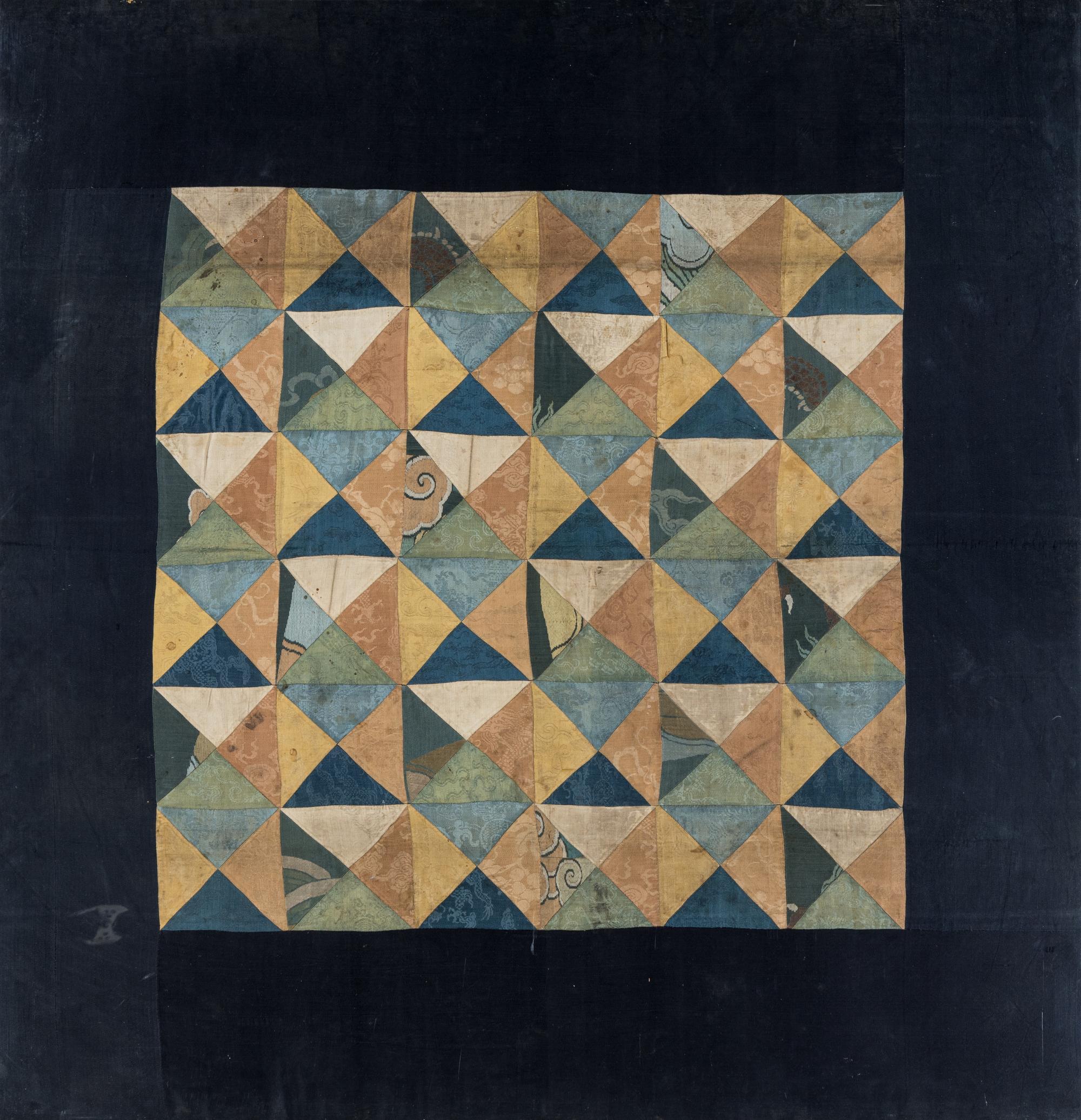 A Tibetan Silk Patchwork Offering Cloth and A Tibetan Rug