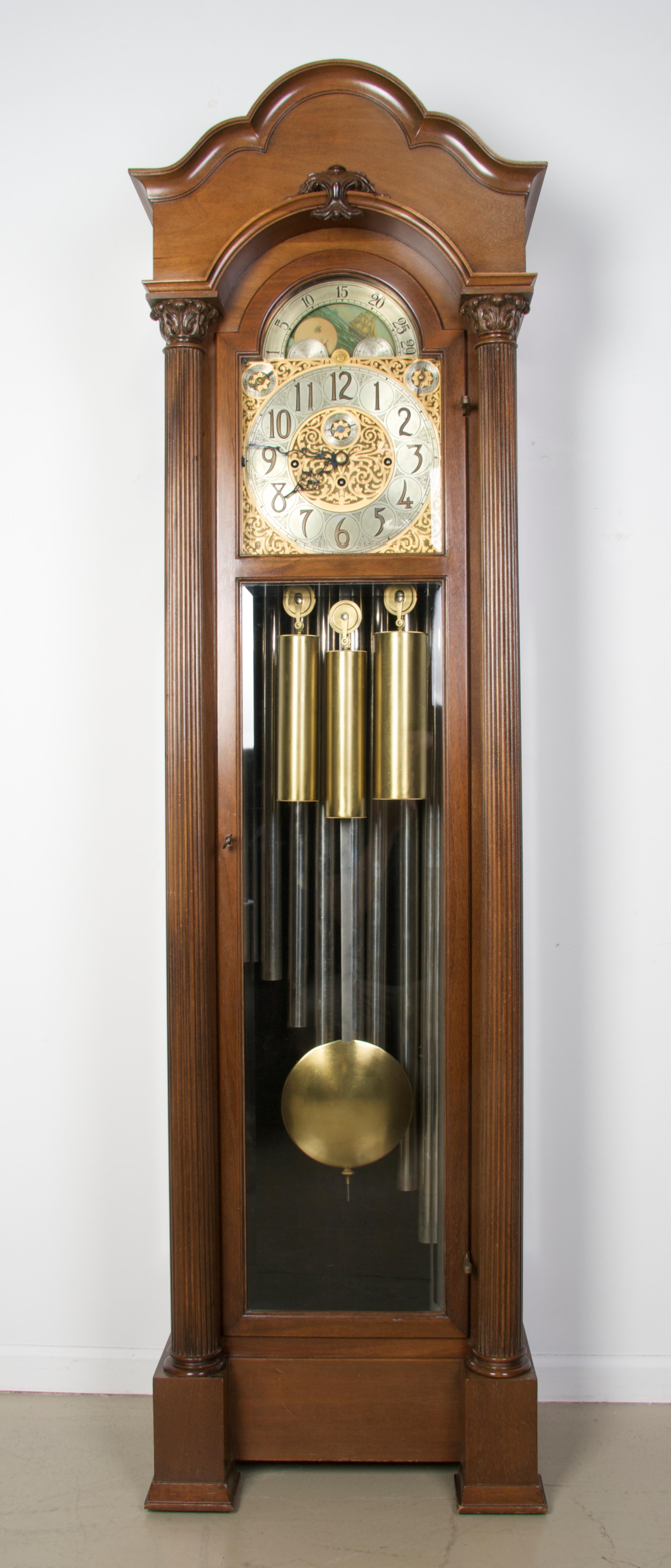 An American Tall Case Clock, Herschede, Height 80 x width 22 1/2 x depth 15 inches.